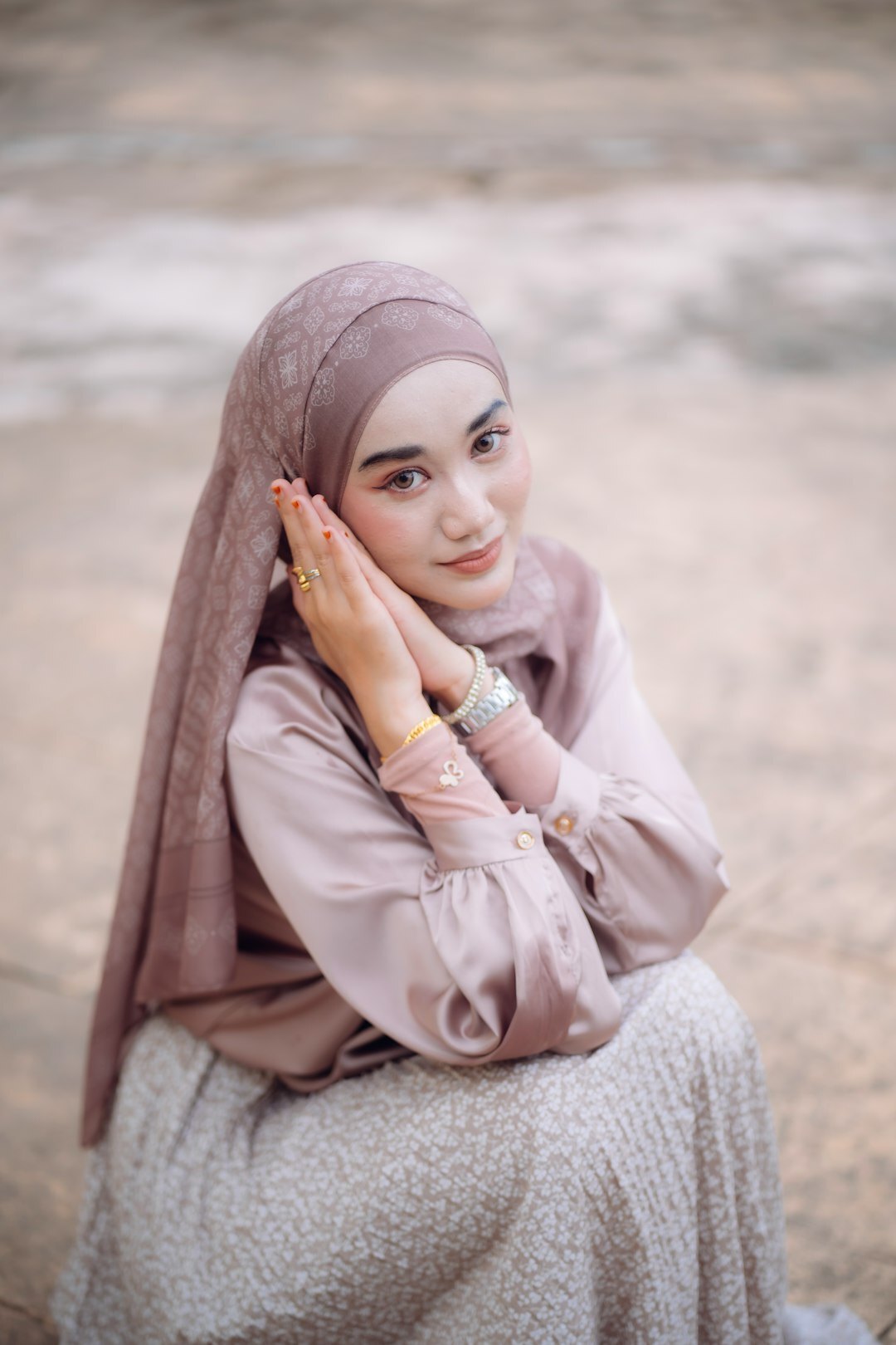 Headshot of a Malay woman compliance and risk advisor smiling